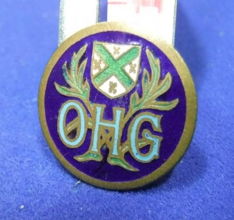 badge ohg stag horns green cross coat of arms highland ? crest