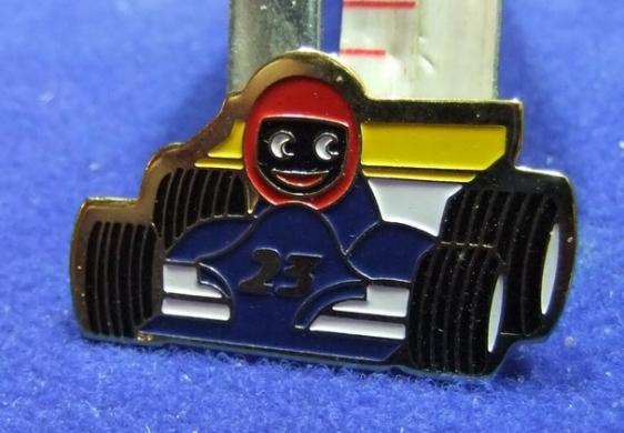 robertsons golly badge brooch racing car driver motoring 1980s