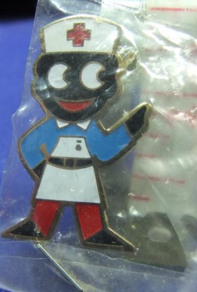 robertsons golly badge nurse 1980s dark blue