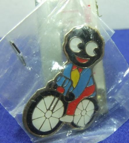 robertsons golly badge cyclist 1980s with bubble coat