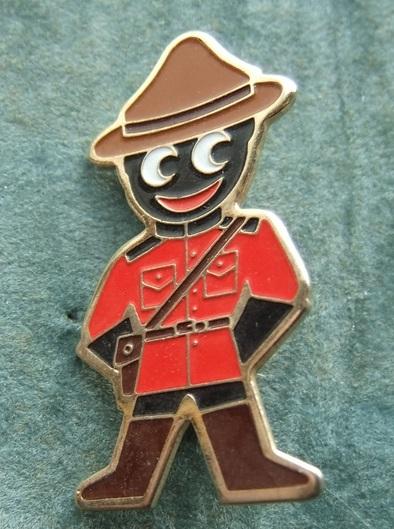 Robertsons Golly Mountie badge brooch 1980s