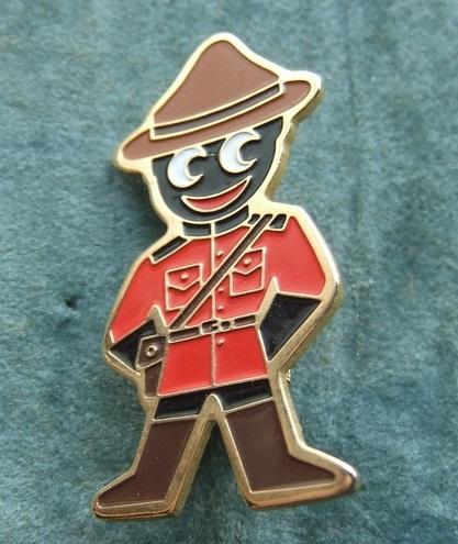 Robertsons Golly Mountie badge brooch 1980s