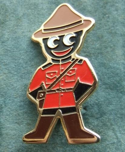 Robertsons Golly Mountie badge brooch 1980s