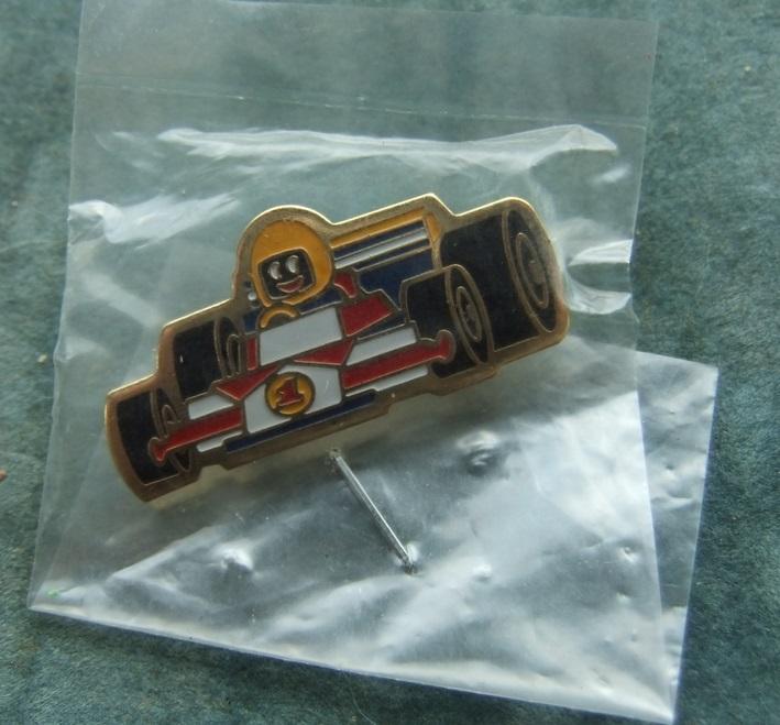 Robertsons golly badge brooch racing car 1990s