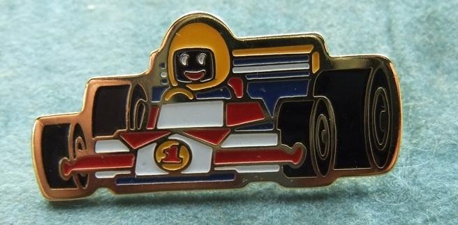 Robertsons golly badge brooch racing car 1990s